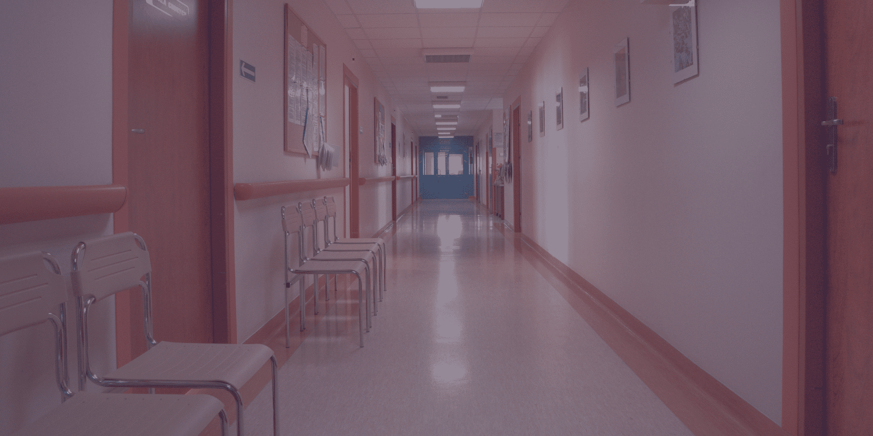 An empty, clinical looking hospital corridor
