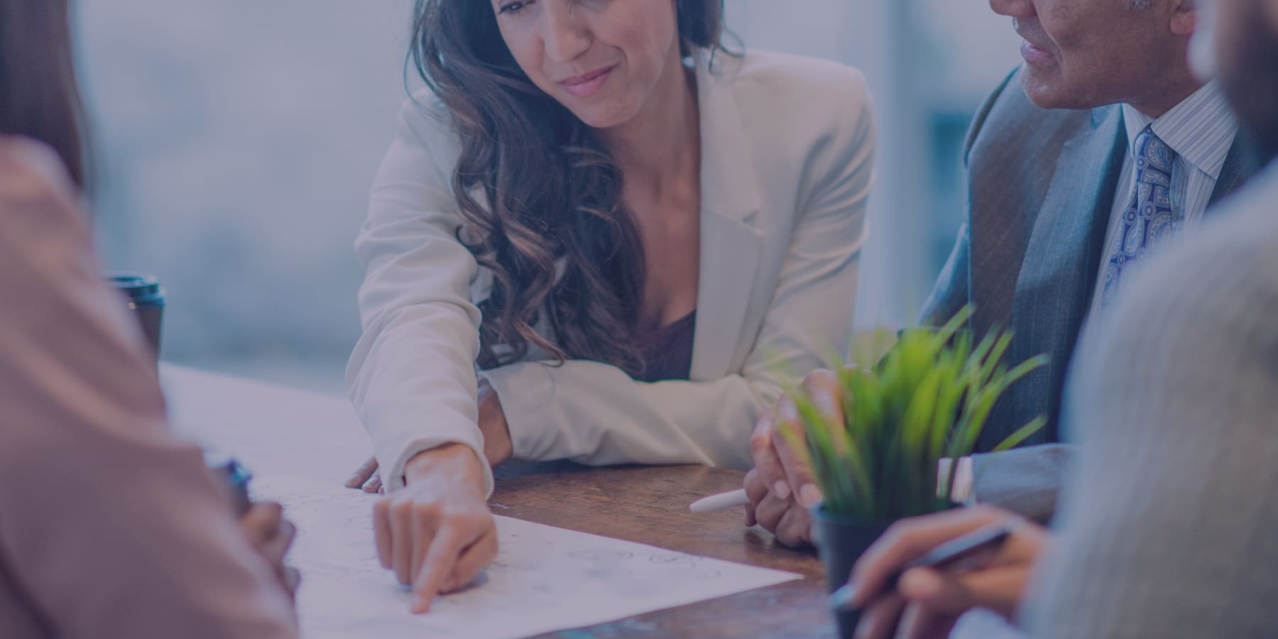 Business leaders discussing unfair dismissal law reforms in a workplace meeting